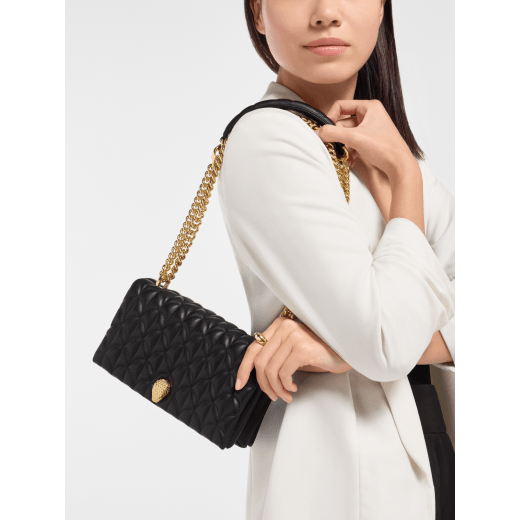 Serpenti Sugarloaf shoulder bag in black calf leather with a distinctive Calla Matelassé motif and black nappa leather lining. Captivating snakehead magnetic closure in gold-plated brass embellished with red enamel eyes. SCB-001-1295S-CALF image 2