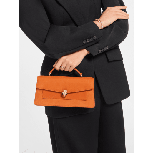 Serpenti Forever Elongated top handle bag in Terracotta nubuck leather with Terracotta nappa leather lining. Captivating snakehead magnetic closure in light gold-plated brass embellished with Terracotta enamel and gold-plated brass scales, and black onyx eyes. 295620 image 1