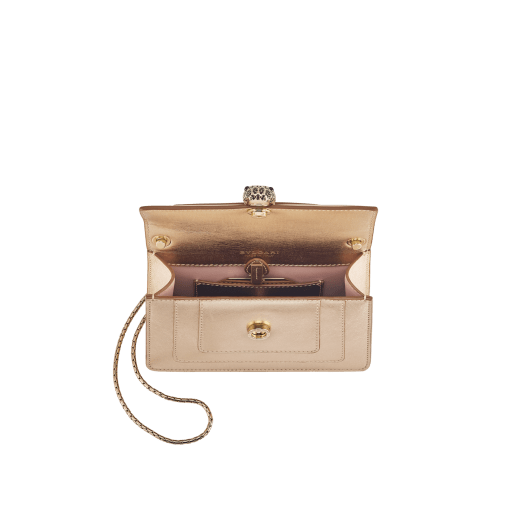 Serpenti Forever mini crossbody bag in light gold Striated calf leather with crystal rose nappa leather lining. Captivating snakehead magnetic closure in light gold-plated brass embellished with black zirconia pavé scales, and black onyx eyes. 293214 image 4
