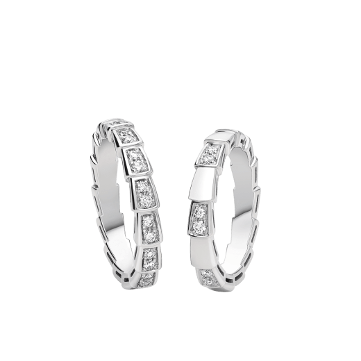 Serpenti Viper couples' rings in 18 kt white gold, one of which (3 mm) is set with demi-pavé diamonds and the other fully set with diamonds. A captivating ring set fusing mesmerizing design with the snake's irresistible allure. SERPENTI-VIPER-COUPLES-RINGS-4 image 1