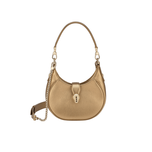 Serpenti Ellipse small crossbody bag in Urban grain and smooth ivory opal calf leather with flamingo quartz pink grosgrain lining. Captivating snakehead closure in gold-plated brass embellished with black onyx scales and red enamel eyes. 1204-UCL image 9