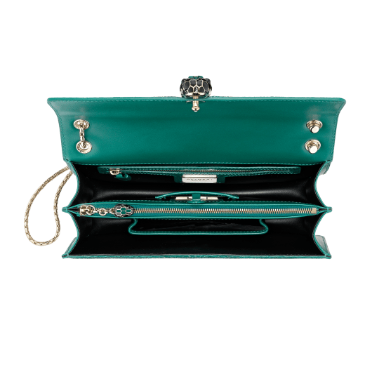 “Serpenti Forever” shoulder bag in emerald green galuchat skin. Iconic snake head closure in light gold plated brass enriched with black enamel, malachite scales and black onyx eyes. 289026 image 4