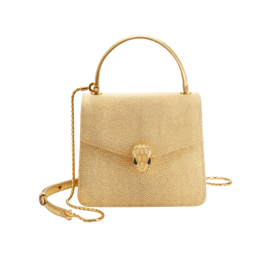 Serpenti Forever top handle bag in gold galuchat skin with black nappa leather lining. Captivating snakehead closure in gold-plated brass embellished with satin-gold scales and black onyx eyes. 752-FG image 1