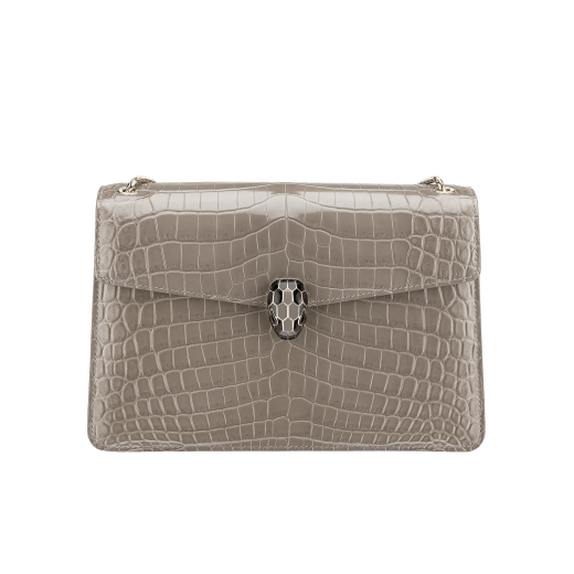 Сумка с верхним клапаном Serpenti Forever, блестящая кожа крокодила цвета королевского сапфира. Застежка в виде змеиной головы из латуни с покрытием из светлого золота, блестящая эмаль черного цвета и цвета королевского сапфира, глаза из черного оникса. 521-CRa image 1