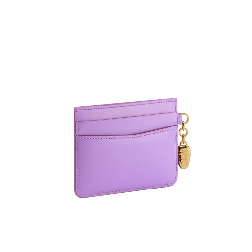 Serpenti Forever card holder in sheer amethyst lilac patent calf leather with black nappa leather lining. Captivating snakehead charm in gold-plated brass embellished with matt sheer amethyst lilac enamel scales and black enamel eyes. SEA-CC-HOLDER-VCL image 3