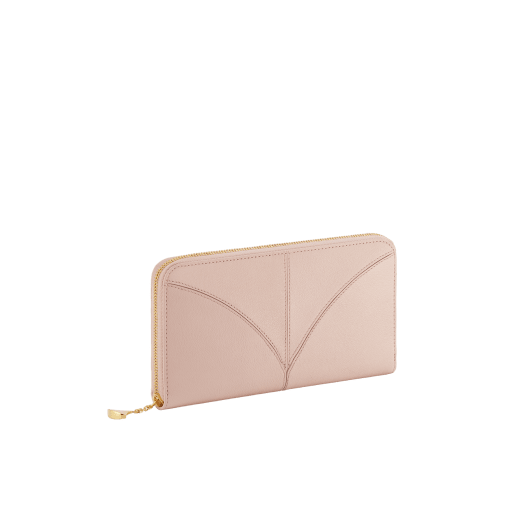 Divas' Dream large wallet in star rose pink goat leather with crystal rose nappa leather interior. Refined gold-plated brass signature charm and zip around closure. DIVA-LONGWLT image 1