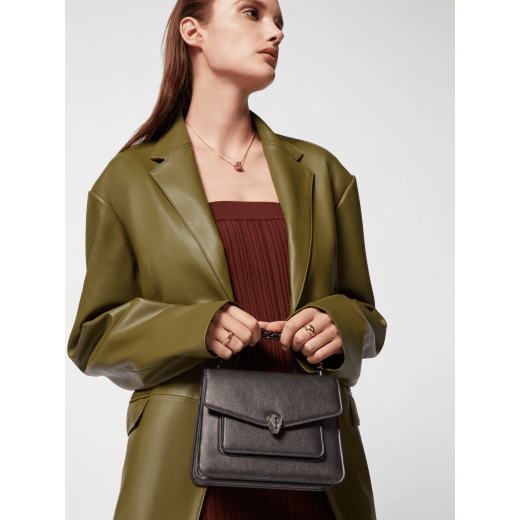 Serpenti Forever Maxi Chain small crossbody bag in flash diamond white grained calf leather with foggy opal grey nappa leather lining. Captivating snakehead magnetic closure in gold-plated brass embellished with white mother-of-pearl scales and red enamel eyes. 1134-MCGC image 7