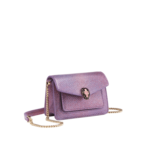 Serpenti Forever micro bag in sheer amethyst lilac Gleamy karung skin with primrose quartz pink nappa leather interior. Captivating magnetic snakehead closure in light gold-plated brass embellished with red enamel eyes. 292934 image 1