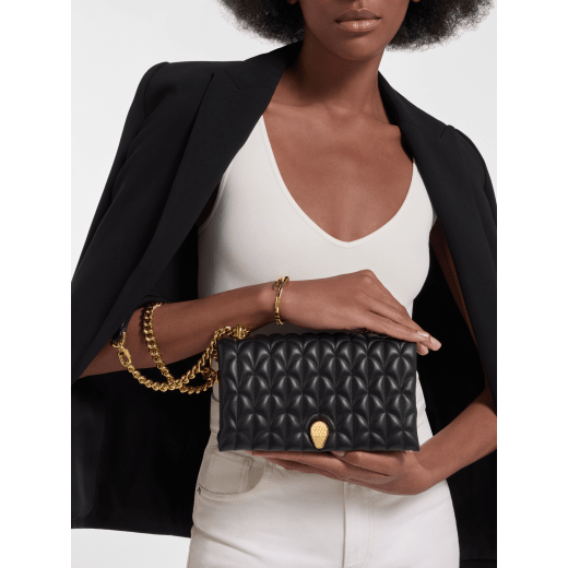 Serpenti Sugarloaf shoulder bag in black calf leather with a distinctive Calla Matelassé motif and black nappa leather lining. Captivating snakehead magnetic closure in gold-plated brass embellished with red enamel eyes. SCB-001-1295S-CALF image 1
