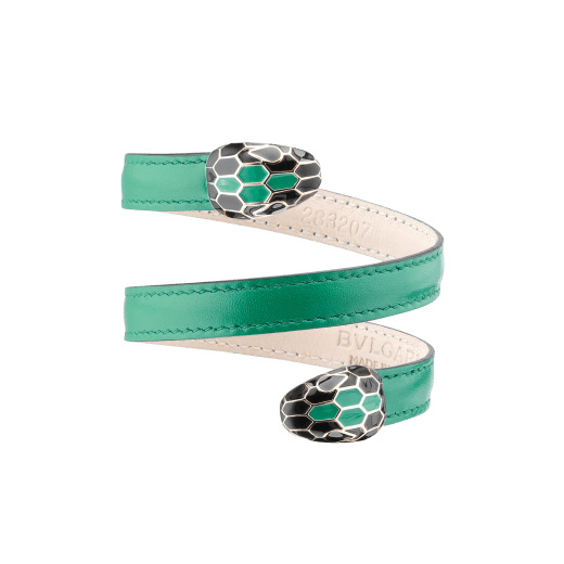 "Serpenti Forever" multi-coiled rigid Cleopatra bracelet in emerald green calf leather, with brass light gold plated hardware. Iconic double snakehead decor enamelled in black and emerald green, finished with seductive eyes in black enamel. Cleopatra-CL-EG image 1