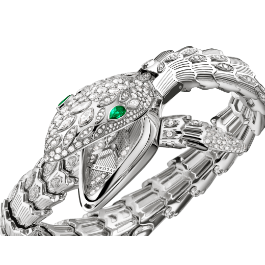 Serpenti Secret Watch with 18 kt white gold case, 18 kt white gold head, dial and single spiral bracelet all set with brilliant cut and marquise cut diamonds, and emerald eyes . 102238 image 2