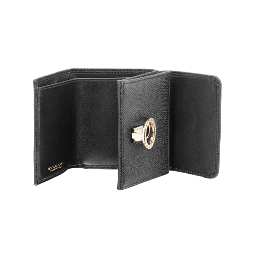 "BVLGARI BVLGARI" compact wallet in Caramel Topaz beige bright grain calf leather and Zephyr Quartz pink soft nappa leather. Iconic logo clip closure in gold plated brass on the flap and a press stud closure on the body. 579-MINICOMPACTa image 2
