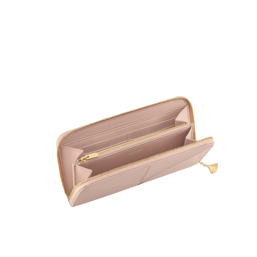 Divas' Dream large wallet in star rose pink goat leather with crystal rose nappa leather interior. Refined gold-plated brass signature charm and zip around closure. DIVA-LONGWLT image 2