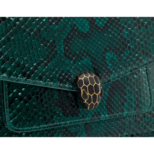 Serpenti Forever medium shoulder bag in Forest Emerald green shiny python skin with black nappa leather lining. Captivating snakehead press button closure in gold-plated brass embellished with black enamel scales, and black onyx eyes. 292580 image 5
