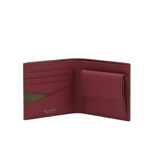 BULGARI BULGARI Man compact wallet in black Urban grain calf leather with forest emerald green Urban grain calf leather interior. Iconic dark ruthenium plated-brass décor enamelled in matte black, and folded closure. BBM-WLTITALASYMa image 2