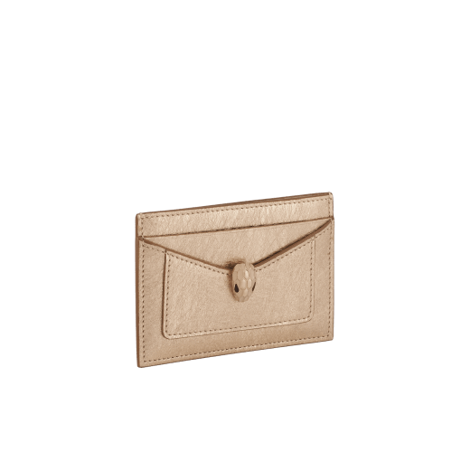 Serpenti Forever card holder in light gold Striated calf leather. Captivating snakehead décor in light gold-plated brass embellished with champagne enamel and light gold-plated brass scales, and black enamel eyes. SEA-CC-HOLDER-R image 1