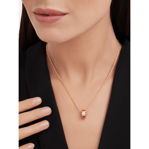 Serpenti Viper 18 kt rose gold pendant necklace set with fancy rubies. 360659 image 1