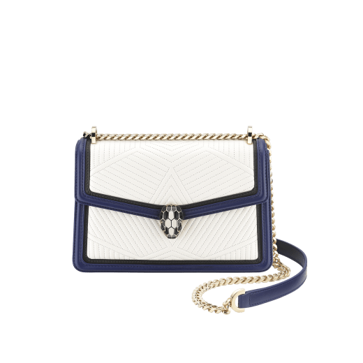 “Serpenti Diamond Blast” shoulder bag in quilted, agate-white nappa leather with Royal Sapphire blue and black calfskin edging and Royal Sapphire blue nappa leather inner lining. Iconic snakehead closure in light gold-plated brass embellished with black and agate-white enamel and black onyx eyes. 922-FQDb image 1