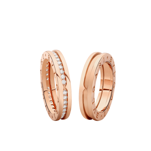 B.zero1 one-band couples' rings in 18 kt rose gold, one of which is set with pavé diamonds on the spiral. A distinctive ring set fusing visionary design with bold charisma. BZERO1-COUPLES-RINGS-3 image 1