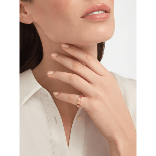 BVLGARI BVLGARI couples' rings in 18 kt rose gold and white gold, both set with a diamond. A timeless ring set blending modern design with distinctive refinement. BVLGARI-BVLGARI-COUPLES-RINGS-4 image 3