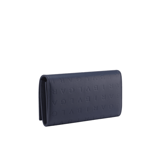 Bulgari Logo large wallet in Poseidon lapis blue calf leather with hot-stamped Infinitum pattern all over and Poseidon lapis blue calf leather interior. Dark ruthenium-plated brass hardware and magnetic closure. BVL-LONGWALLETb image 3