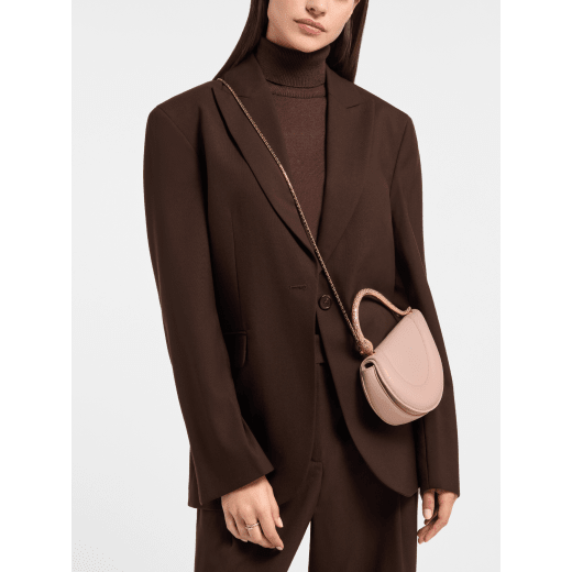 Serpenti Cuore 1968 top handle bag in star rose pink calf leather with crystal rose nappa leather lining. Captivating snake body-shaped top handle in gold-plated brass embellished with star rose pink enamel scales and zirconia eyes; press-button closure. SRN-001-1326S image 1