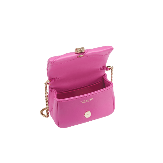 Serpenti Cabochon micro bag in sun citrine yellow calf leather with a maxi matelassé pattern and taffy quartz pink nappa leather interior. Captivating snakehead magnetic closure in light gold-plated brass embellished with red enamel eyes. SCB-NANOCABOCHONb image 2