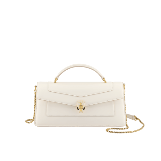 Serpenti Forever Elongated top handle bag in black calf leather with black nappa leather lining. Captivating snakehead magnetic closure in light gold-plated brass embellished with black enamel and light gold-plated brass scales, and black onyx eyes. SEA-001-1390S image 4