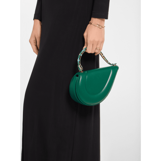 Serpenti Cuore 1968 top handle bag in perla white calf leather with perla white nappa leather lining. Captivating snake body-shaped top handle in gold-plated brass embellished with perla white and black enamel scales and zirconia eyes; press-button closure. SRN-001-1367S-r image 1