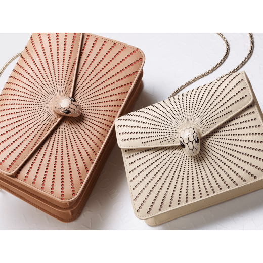 Serpenti Forever crossbody bag in ivory opal laser-cut calf leather with caramel topaz beige nappa leather lining. Captivating snakehead closure in light gold-plated brass embellished with matte and shiny ivory opal enamel scales and black onyx eyes. 422-LCL image 5