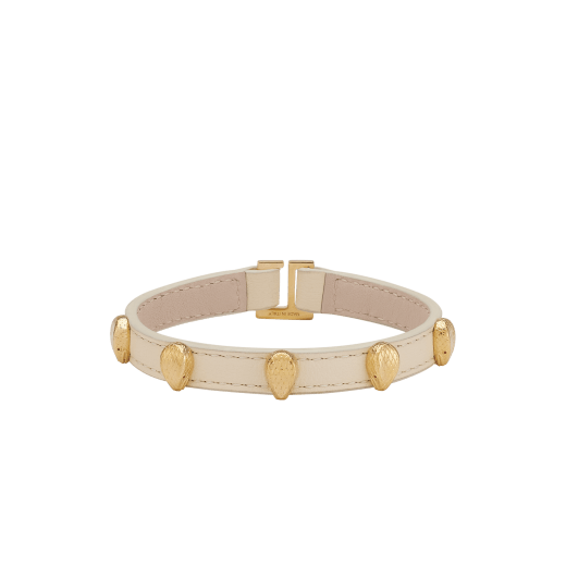Serpenti Forever bracelet in ivory opal calf leather. Multiple captivating snakehead embellishments in gold-plated brass finished with red enamel eyes, and hook-and-eye closure. SER-MULTIHEADS-MCL-IO image 1