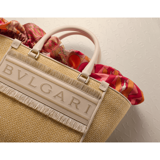 Bulgari Logo medium tote bag in beige raffia with ivory opal calf leather details, beige raffia fringes and beetroot spinel fuchsia nappa leather lining. Iconic Bulgari logo stitched motif, detachable satin satchel with multicolored print outside and beetroot spinel fuchsia inside, and drawstring closure with captivating snakeheads in light gold-plated brass. 292073 image 11