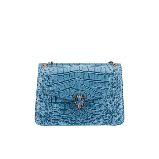 Serpenti Forever shoulder bag in Niagara sapphire blue Cloudy alligator skin with black nappa leather lining. Captivating snakehead closure in light gold-plated brass embellished with black enamel scales, blue jade scales in the centre and black onyx eyes. 1140HE-A image 1