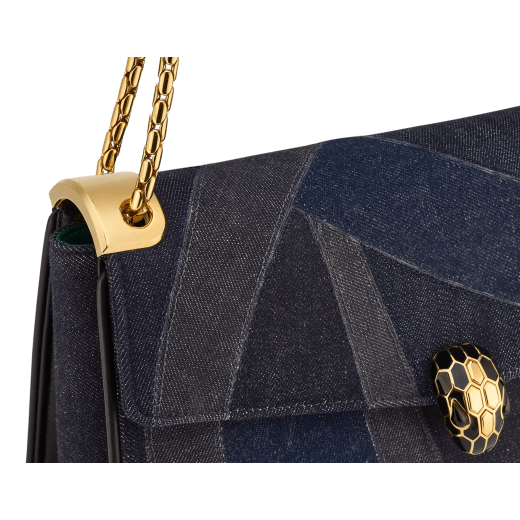 Serpenti Forever large shoulder bag in blue Patch Denim with emerald green nappa leather lining. Captivating snakehead magnetic closure in gold-plated brass embellished with black enamel and gold-plated brass scales, and black onyx eyes. 293464 image 5