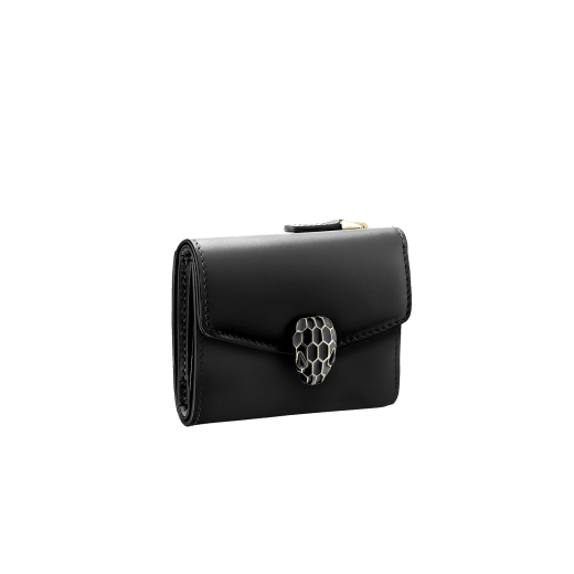 Serpenti Forever slim compact wallet in emerald green calf leather with black nappa leather interior. Captivating snakehead press button closure in light gold-plated brass embellished with black and white agate enamel scales and black onyx eyes. SEA-SLIMCOMPACT-Clb image 1
