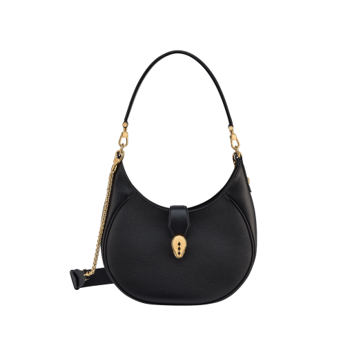 Serpenti Ellipse medium shoulder bag in Urban grain and smooth ivory opal calf leather with flamingo quartz pink gros grain lining. Captivating snakehead closure in gold-plated brass embellished with black onyx scales and red enamel eyes. 1190-UCL image 2