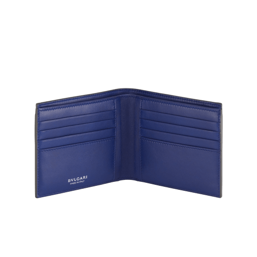 "BVLGARI BVLGARI" hipster compact wallet in black soft full grain calf leather and white agate calf leather. Iconic logo decoration in palladium plated brass coloured in white agate enamel BBM-WLT-HIPST-8C-SFGCL image 2