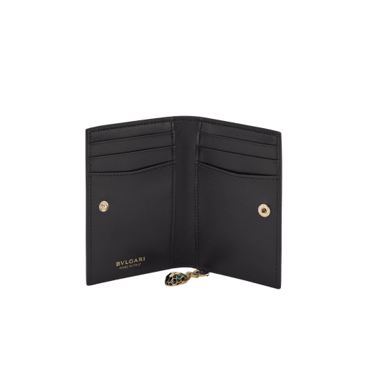 "Serpenti Forever" folded card holder in "Molten" light gold karung skin and black calf leather. New Serpenti head charm in gold-plated brass, finished with red enamel eyes. SEA-CC-HOLDER-FOLD-MKa image 2