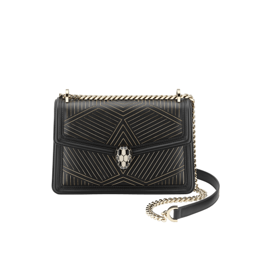 “Serpenti Diamond Blast” shoulder bag in white agate calf leather, featuring a Whispy Chain motif in light gold finishing. Iconic snakehead closure in light gold plated brass enriched with black and white agate enamel and black onyx eyes. 922-WC image 2
