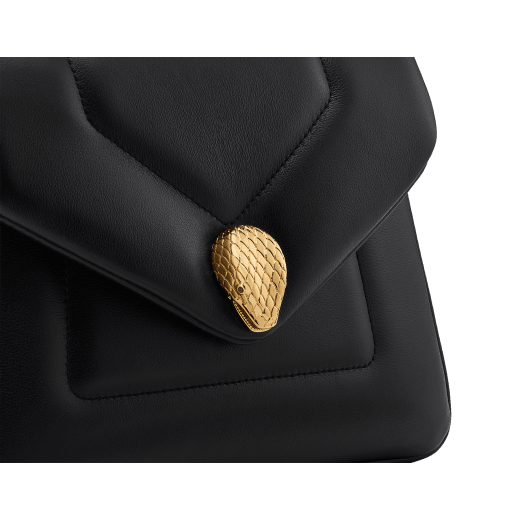 Serpenti Reverse small top handle bag in black quilted Metropolitan calf leather with black nappa leather lining. Captivating snakehead magnetic closure in gold-plated brass embellished with red enamel eyes. 1234-MCL image 7