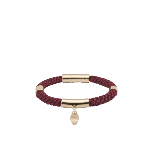Serpenti Forever bracelet in anemone spinel pinkish red woven fabric. Captivating snakehead charm in light gold-plated brass embellished with red enamel eyes, and press-button closure. SERPMULTISTRING-WF-AS image 1