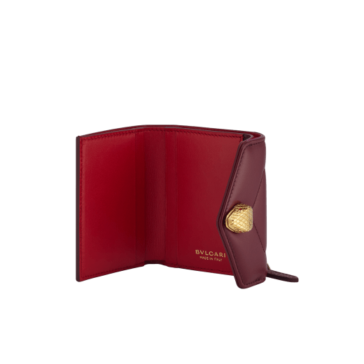 Serpenti Reverse compact wallet in Sahara amber light brown quilted Metropolitan calf leather with taffy quartz pink Metropolitan calf leather interior. Captivating snakehead press button closure in gold-plated brass embellished with red enamel eyes. SRV-COMPACTWLT image 2