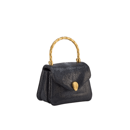Serpenti Reverse micro top handle bag in soft emerald green galuchat skin with black nappa leather lining. Captivating magnetic snakehead closure in light gold-plated brass embellished with red enamel eyes. SRV-NANOREVERSE image 2