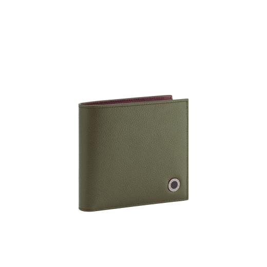 BULGARI BULGARI Man compact wallet in black Urban grain calf leather with forest emerald green Urban grain calf leather interior. Iconic dark ruthenium plated-brass décor enamelled in matte black, and folded closure. BBM-WLTITALASYMa image 1