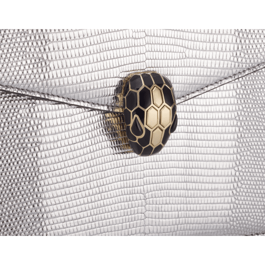 Serpenti Forever small crossbody bag in silver Molten lizard skin with foggy opal gray nappa leather lining. Captivating snakehead magnetic closure in light gold-plated brass embellished with black enamel and light gold-plated brass scales, and black onyx eyes. 293341 image 5