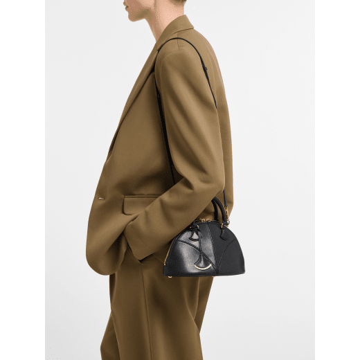 Marquise small top handle bag in black goat leather with black nappa leather lining and zipped closure. Detachable signature black goat leather charm with mirror. DAS-001-1325S image 1
