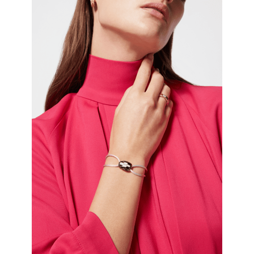 Serpenti Forever bracelet in primrose quartz pink fabric. Captivating light gold-plated brass snakehead embellishment with black and white agate enamel scales and black enamel eyes. 292806 image 2