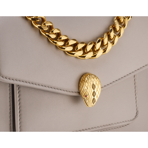 Serpenti Forever Maxi Chain small crossbody bag in foggy opal grey Metropolitan calf leather with linen agate beige nappa leather lining. Captivating snakehead magnetic closure in gold-plated brass embellished with grey agate scales and red enamel eyes. 1134-MCMC image 5