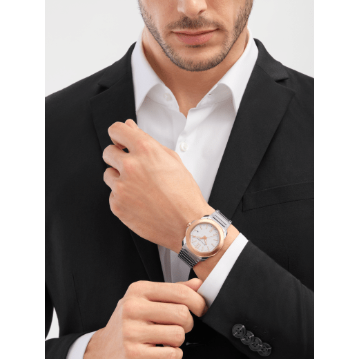 Octo Roma watch in stainless steel with additional interchangeable brown rubber strap, 18 kt rose gold bezel and grey Clous de Paris dial. Mechanical manufacture movement with automatic winding. Water-resistant up to 100 metres. 103928 image 1