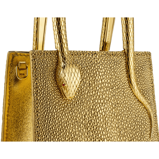 Serpentine mini tote bag in gold galuchat skin with 24 kt gold treatment, shiny gold Mirage nappa leather sides and black nappa leather lining. Captivating snake-shaped handles in gold-plated brass including 3 µ of 24 kt gold, embellished with engraved scales and red enamel eyes. Exclusive Bulgari 50th anniversary in the US Edition. 292705 image 5